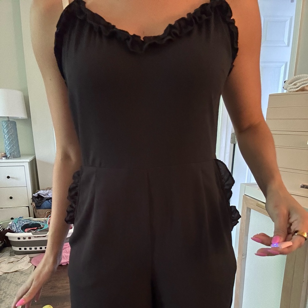 Black chiffon jumpsuit with ruffles